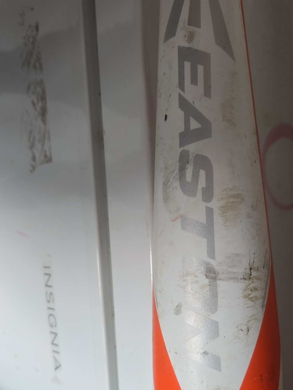 Easton 26" White and Orange Baseball Bat with Silver Logo